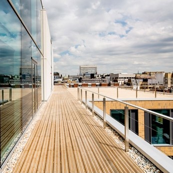 Treated softwood decking meets architectural aesthetics