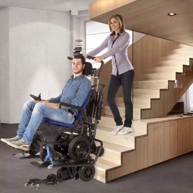 New powered stairway climber carries any wheelchair safely