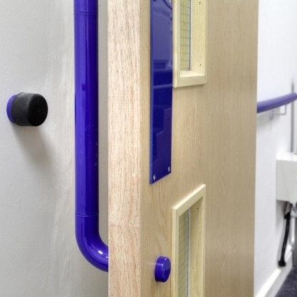 Colourful hardware scheme for care home