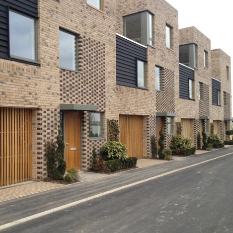 Ventilated garage door systems for new housing project in Cambridge