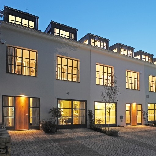 Steel windows provide mews with an urban aesthetic