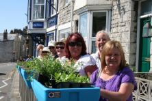 Competitors and visitors welcomed with flowers